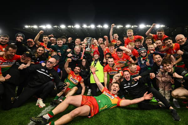 Carlow players and staff celebrate with the cup after the Allianz Football League Division 4 final at Croke Park in Dublin. Photo: David Fitzgerald/Sportsfile