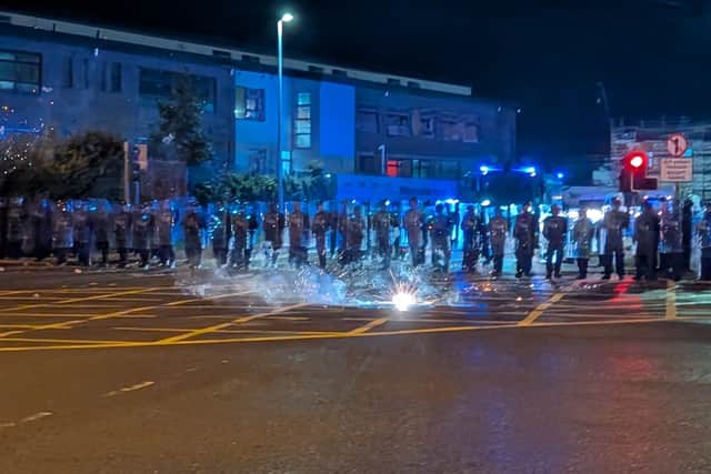 Tánaiste Simon Harris said there was “no excuse” for the violent “thuggery” witnessed outside the hotel.
