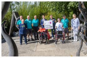 Trevor Gillespie from the Delta Centre with Cllr. Daniel Pender, Leas Cathaoirleach, and the Delta Team