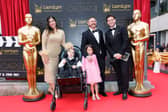 Nicoly, Theo, Ana-Julia, Marco Morelli Messias and LauraLynn Oscars MC Eric Robert pictured on the red carpet for the LauraLynn Oscar