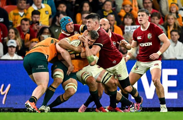 Nick Champion de Crespigny of Australia Tadhg Beirne and Dan Sheehan of British & Irish Lions during the first test matchat Suncorp Stadium in Brisbane | PICTURES: Sportsfile
