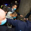 The man charged with the murder of Ashling Murphy is escorted by gardaí PICTURE: Ger Rogers