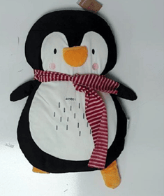 The item in question is a penguin shaped cushion. A safety issue was identified as the red scarf worn by the penguin is longer than safety guidelines and can pose a risk of strangulation.