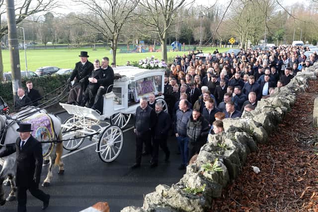 The funeral cortege was made up of 10 horses - led by two black Friesian horses following by eight white shire horses. Raindrops dripped down the side of the glass-panelled carriage. The horses and carriage were jointly provided by Thomas Clarke of T Clarke Carriages in Dublin and John O’Grady Carriages in Sixmilebridge.