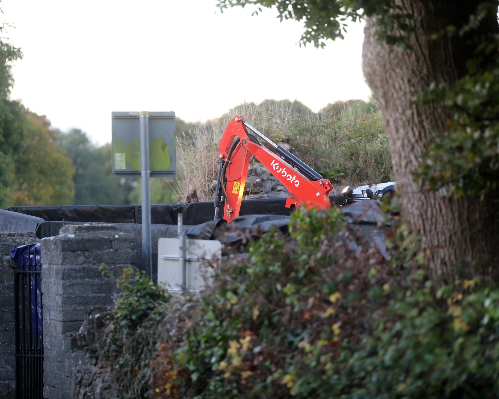 The remains of Patrick Nugent being exhumed at Feenagh cemetery in County Clare | PICTURE: Brendan Gleeson