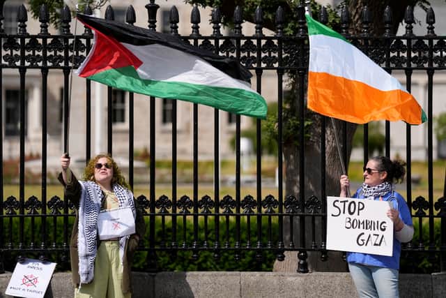 At the Kildare Street end, a larger demonstration was held to the beat of drums, with people chanting “Free, free Palestine” and “Occupation no more” while waving Palestinian flags.