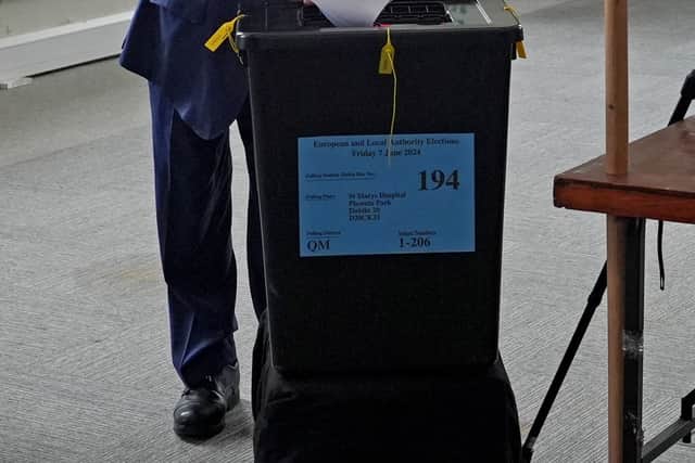 As he placed his ballot papers inside the box, Mr Higgins said: “Sin e.” (That’s it.)