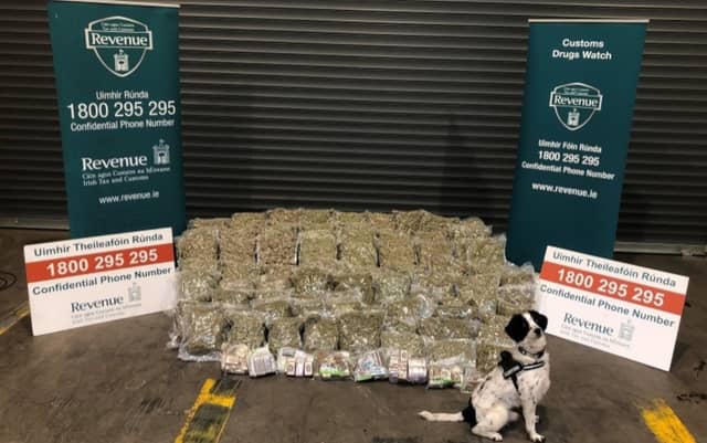 Detector dog Milo poses with over €1.6 million of cannabis