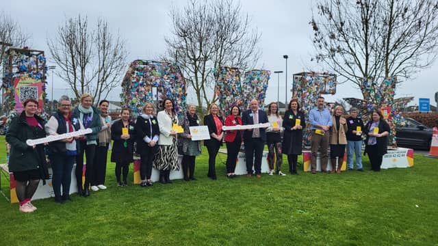 Representatives from SETU and Amber Women's Refuge at the 'LOVE' art installation of the One Million Stars Project at the university's Carlow campus this week, Photo credit: SETU