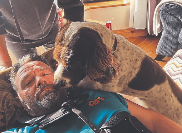 Tom Flavin pictured with Bruno after coming home from hospital