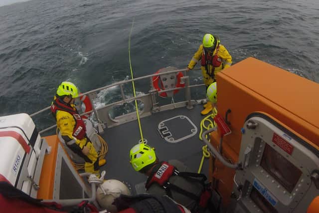 The crew of seven volunteer members assessed the situation and the decision was made to establish a stern tow line and bring the boat and its passengers back to Cork harbour. Once the tow line was secured, the lifeboat and stricken boat made way at a speed of 4-5 knots.