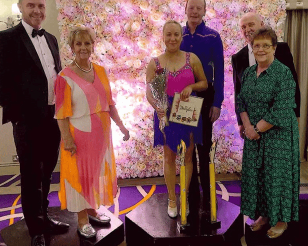 Ruth and John pictured with competition organisers Brian Redmond, Pauline Meagher, Thomas Redmond and Annette Redmond.