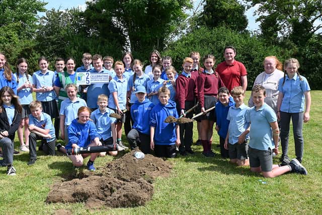 Scoil Molaise will receive a gift of An Choill Bheag (little woodland) as the backdrop for the outdoor classroom in which the time capsule is buried.
