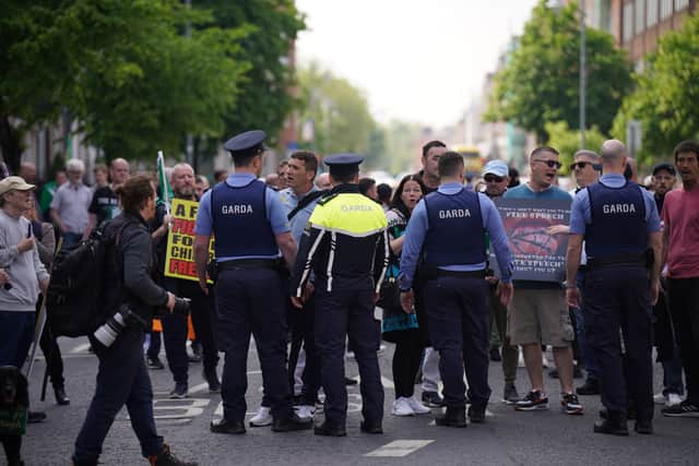 At the end of that rally, a smaller group of demonstrators marched towards Mount Street Lower, where dozens of tents have been erected in another makeshift camp for homeless migrants.