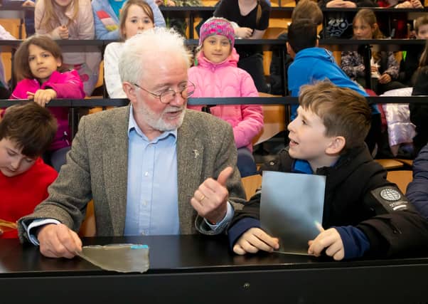 Minister Malcolm Noonan pictured at SETU's campus in Carlow with students from Carlow Educate Together and St Joseph's National School discussing the importance of bioplastics and the environment.