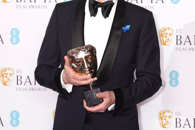 German composer Volker Bertelmann said the film had showed him that “humanity, empathy and embracing diversity of human beings and nations” is “the most important in our world” as he won the original score category.