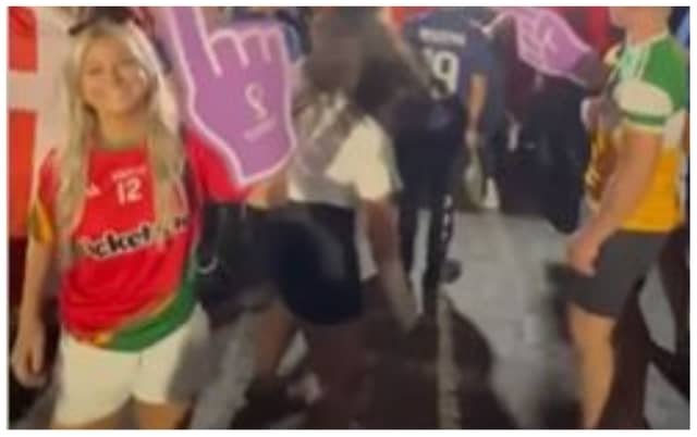 WATCH: Man in Offaly jersey lurking in the background as fellow Irish fan hilariously gate crashes live French TV interview in Qatar