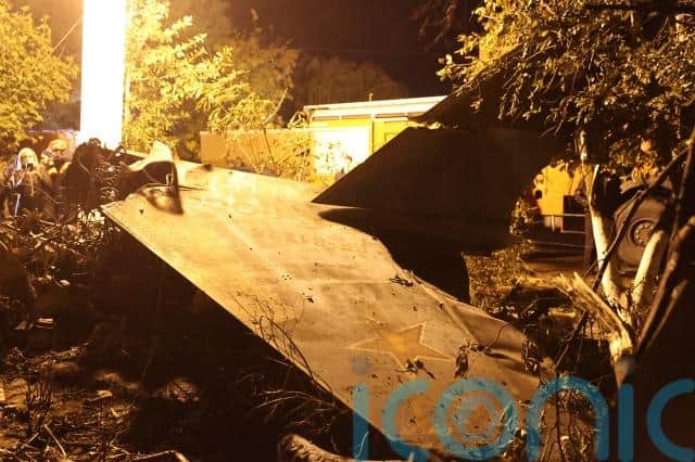 It said both crew members bailed out safely but the plane crashed into a residential area, causing a fire as tonnes of fuel exploded on impact. 