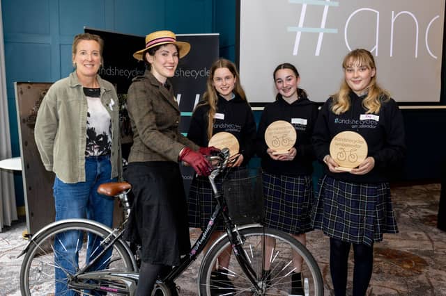 Anna Miller, Tara Lyons and Amy Keating from Presentation College Carlow pictured with their teacher Karen Kavanagh and performer Elaine Gallagher at the #AndSheCycles Award Ceremony in Dublin