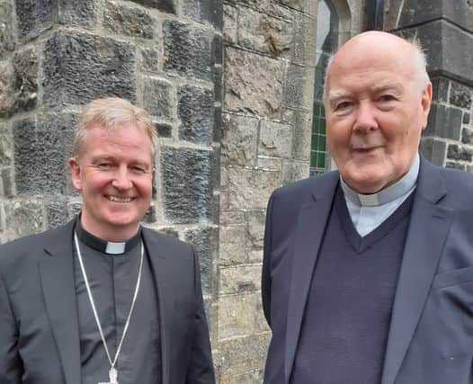 Fr Francis MacNamara (below right) from Mountmellick attended the ceremony.