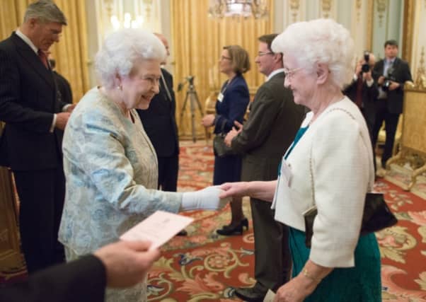 Alice Kennedy from Clonaslee meets the Queen in 2014