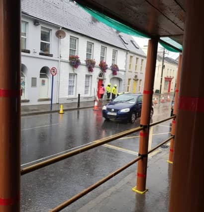 Council staff dealing with flooding on Burrin Street in Carlow Town