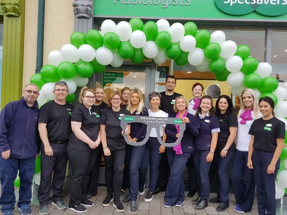 Pictured at the fundraising bake sale is staff at Specsavers Carlow