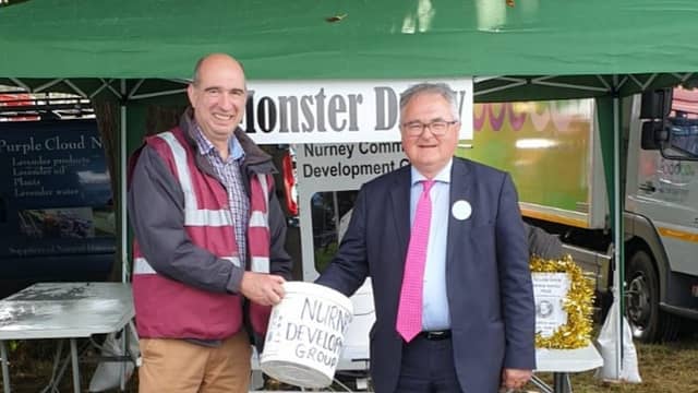 David Smyth (group committee member) and Richard Codd (chairperson of the Tullow Show) performing the day draw for the fundraiser