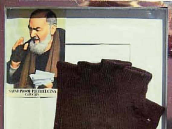 File picture of Padre Pio glove
