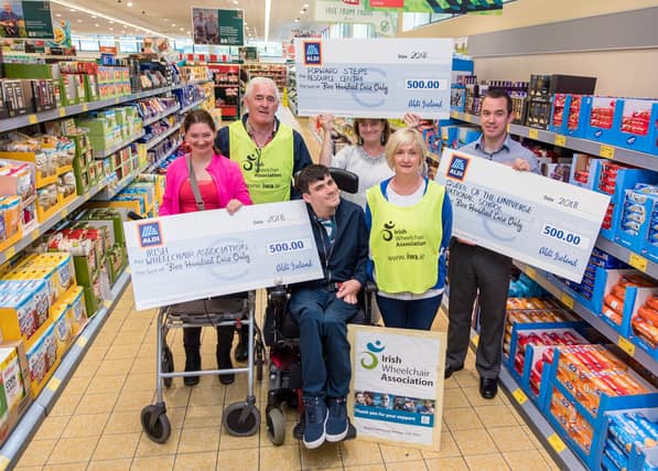 Pictured from L- R are: representatives of the Irish Wheelchair Association Carlow, Molly Kirwan of Forward Steps Resource Centre and Cathal Cole of Queen of the Universe National School