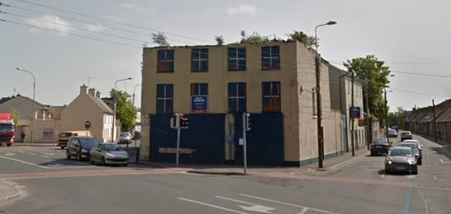 This building on Shamrock Square has been painted with a mock shopfront