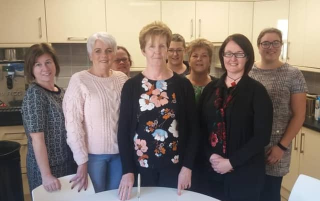 Mary Kelly (centre) celebrated at Carlow Garda Station