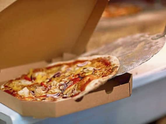 The defendant was delivering pizza when he was stopped
