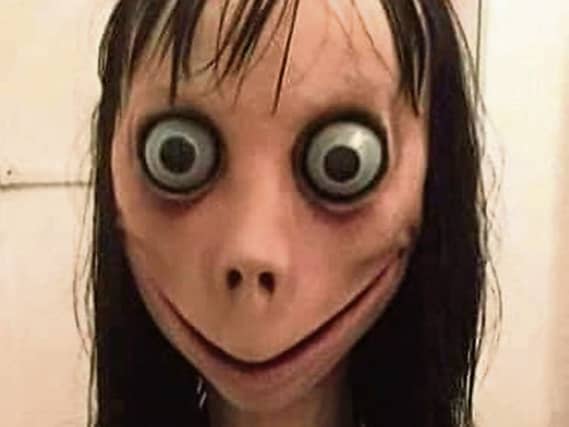 This is an image of the controversial 'Momo' face