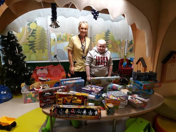 Brandon Bolger donates toys to Crumlin's Children Hospital