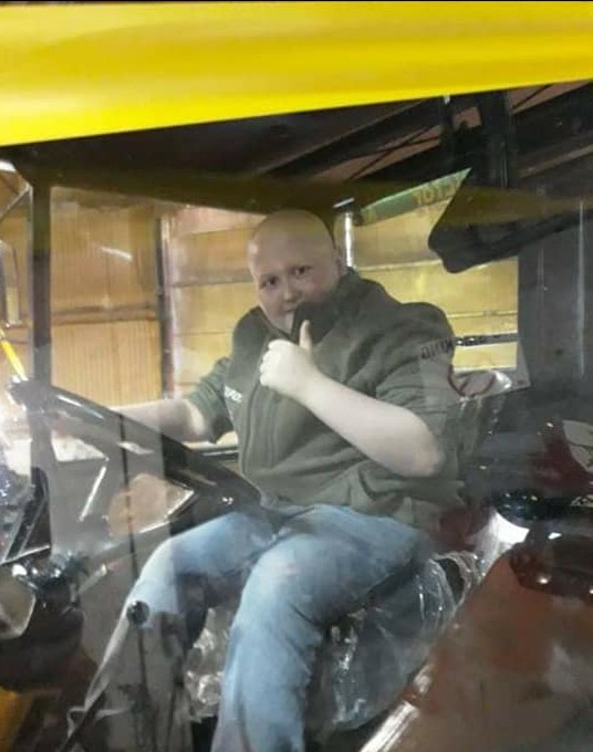 Brandon Bolger pictured in his new tractor