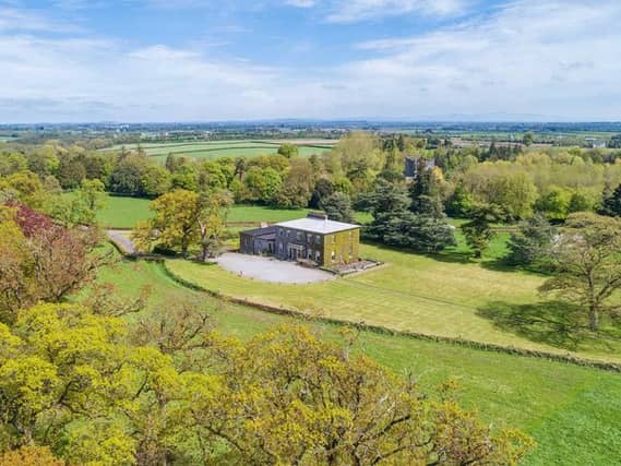 The property boasts seven bedrooms and six baths