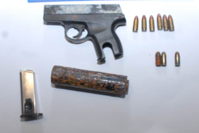 Armed gardai were involved in the search during which firearms including two semi-automatic pistols, ammunition and a replica grenade were found.