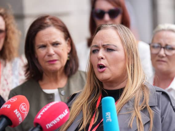Donna Harper speaking into a microphone