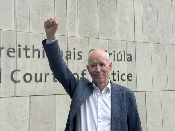 Osgur Breatnach raising a fist in the air