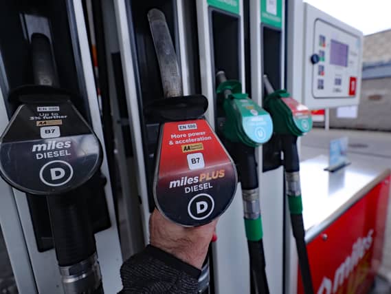 A man using a diesel pump in Dublin