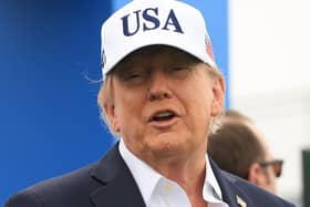 President Donald Trump in a USA baseball cap