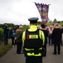Orangemen at a police barricade close to Drumcree Church formed to prevent them entering the Garvaghy Road