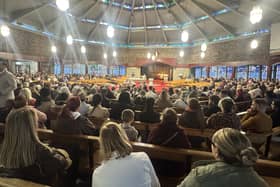 People during a vigil at Sacred Heart Church in Waterford