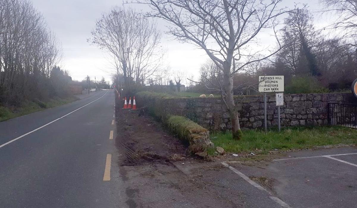 Council start clearing stone wall at Brownshill Dolmen back to