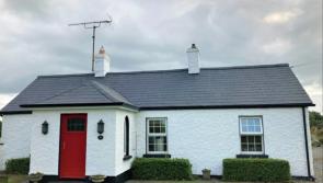 This stunning cottage has the perfect blend of rural living and a convenient location