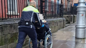 'It only takes a minute to be sound' - Garda praised for moving man in wheelchair out of the rain