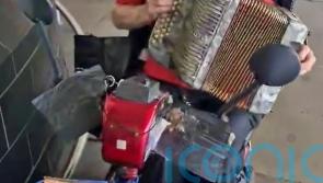 ‘Sweet, lovely’ 87-year-old man shown busking for Ukraine months before attack