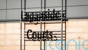 Two men due to appear in court on terrorism charges connected with New IRA probe