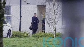 Dismissed teacher stands outside school for a second day